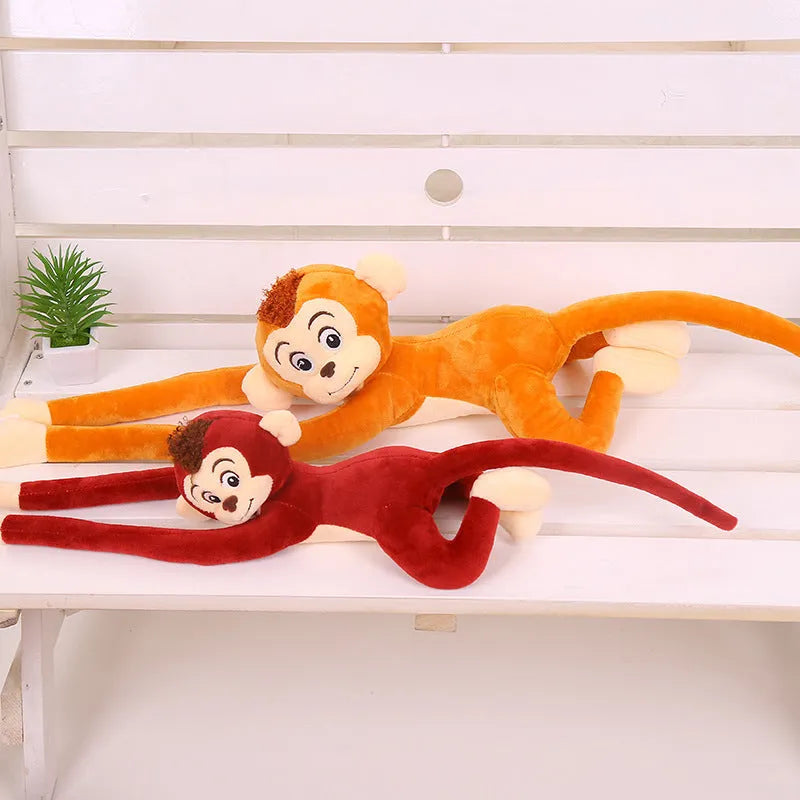 Long arm plush monkey toy hanging as curtain decoration in pink, wine red, dark brown, or light brown