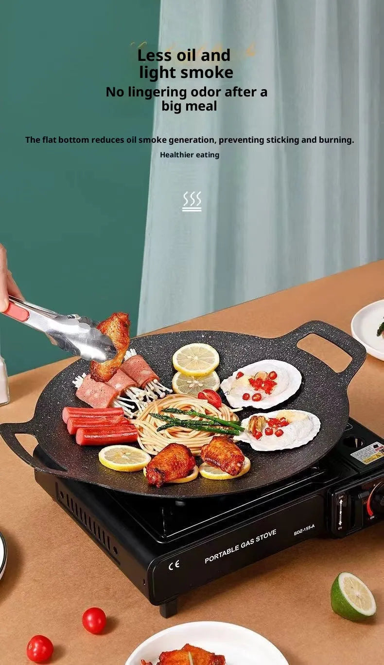 Round Maifan stone non-stick baking tray in iron, shown in 28cm to 38cm sizes for oven baking