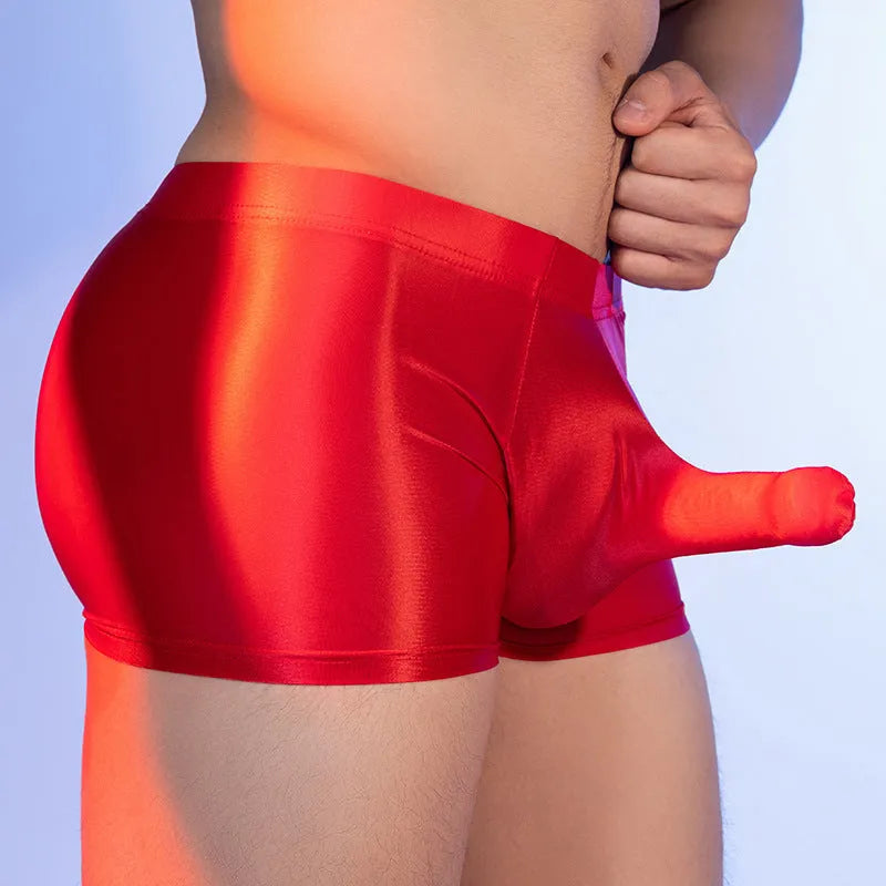 Men's seamless boxer shorts in red nylon fabric showing mid-waist and hip-lifting design