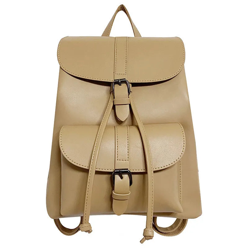 Retro college style small PU bucket bag in khaki with clamshell opening and multiple interior pockets