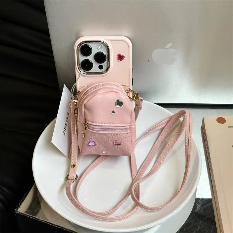 Crossbody wallet phone case for Apple iPhone with removable shoulder strap in antique white finish.