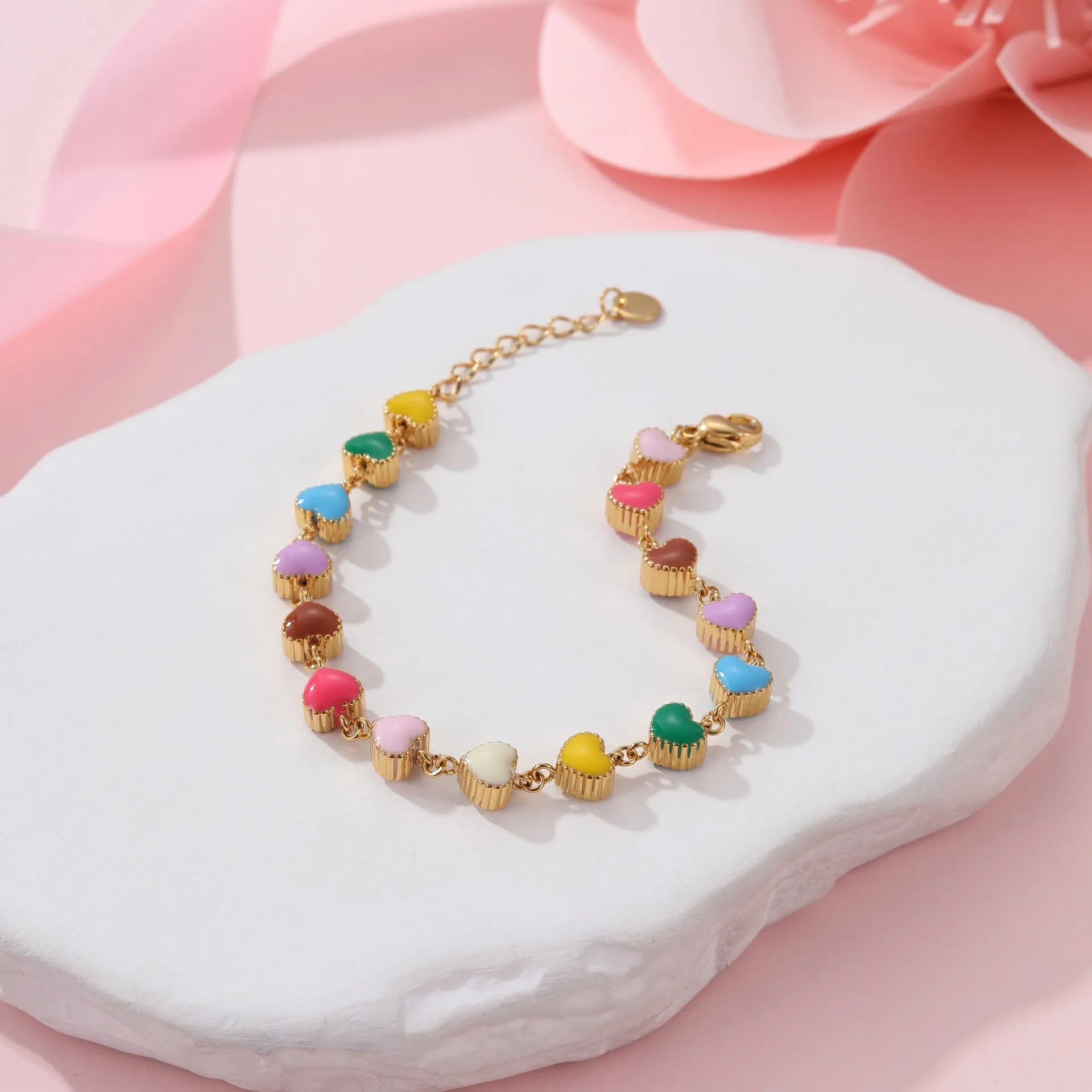 Women's titanium steel bracelet with heart-shaped charm in gold or steel electroplated finish