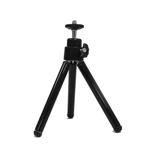 Mini flexible aluminium tripod with ball head and separate phone clip on desktop