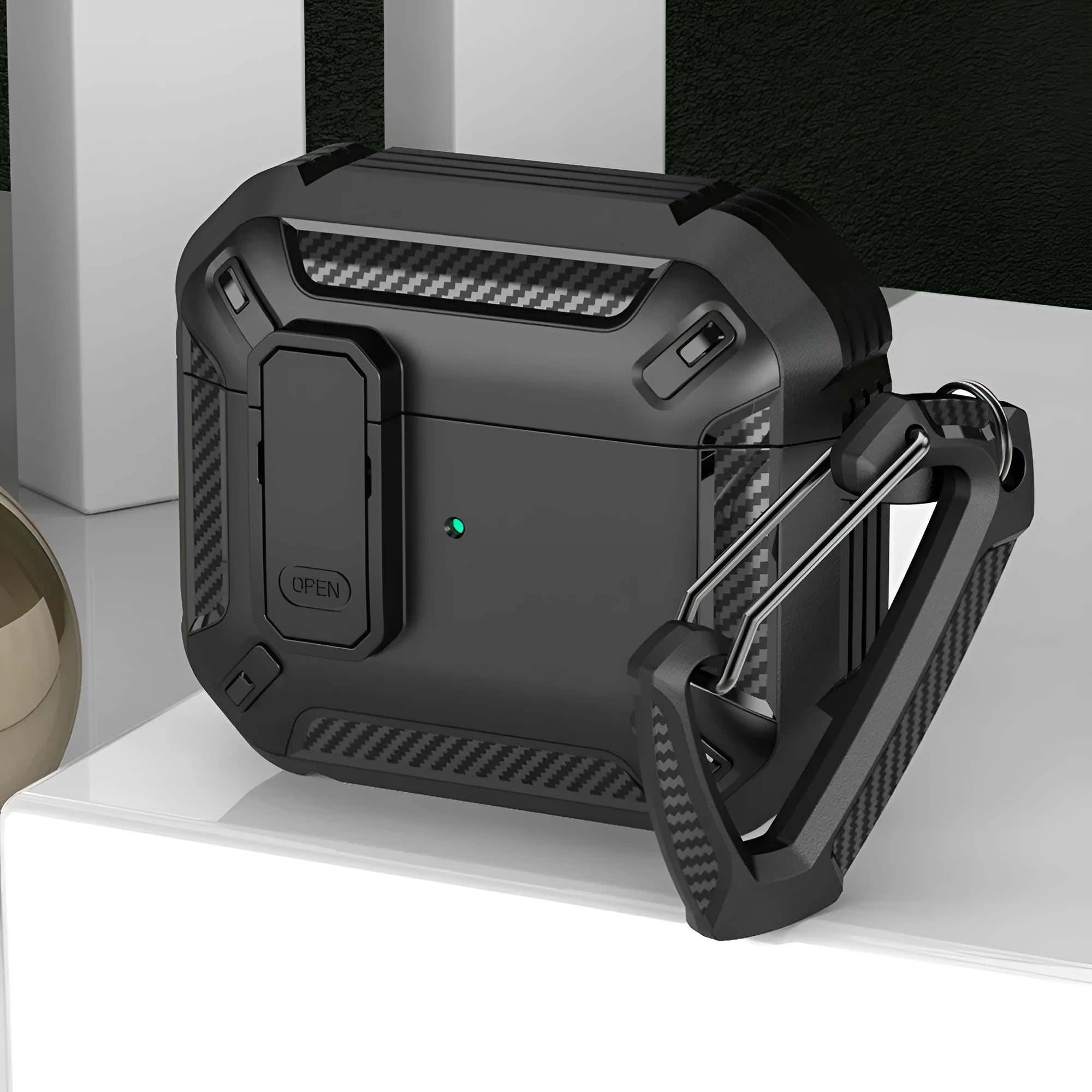 Plastic clamshell protective case for Apple AirPods with a removable metal carry hook attached.