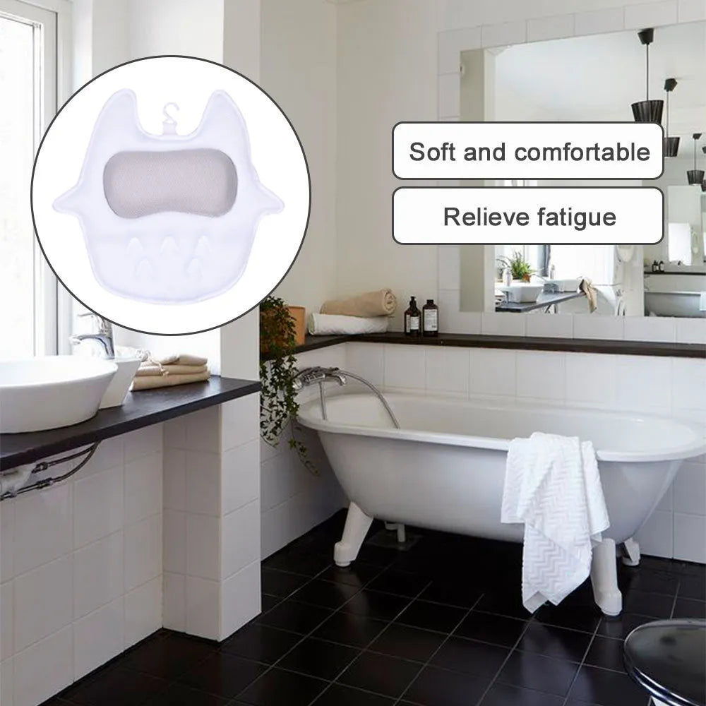 White ergonomic bathtub pillow with owl shape, 5D mesh fabric, and strong suction cups on a smooth bath surface