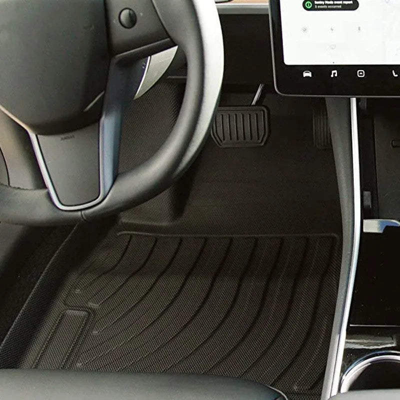 Custom rubber and TPE floor mat set for Tesla Model 3, Y, X, and S interior protection.