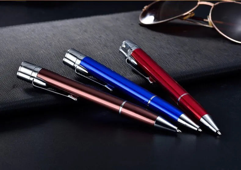 Slim metal windproof jet lighter pen in assorted colours showing refillable butane port and ignition button.
