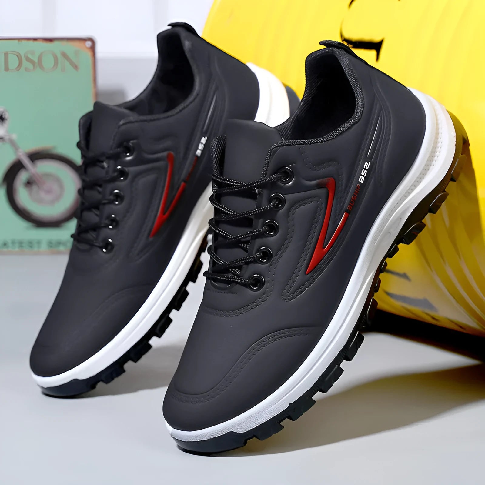 Black and grey waterproof leisure sports shoes with soft plastic soles and pointed-toe design