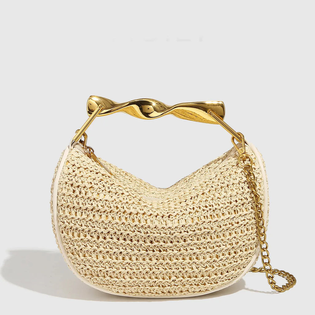 Straw woven dumpling chain crossbody bag in black PU leather with woven texture and chain shoulder strap.