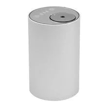 Black rechargeable car air freshener diffuser with automatic mist spray in vehicle cup holder