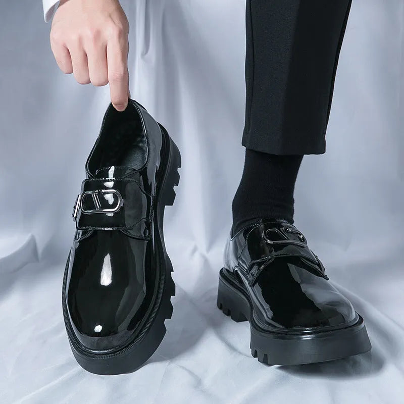 Men's glossy black platform loafers with a low hidden heel for summer wear.