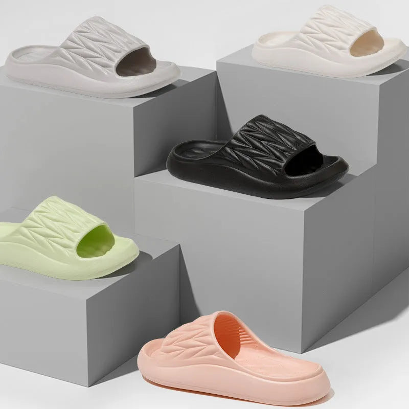 Leaf texture design EVA slippers in multiple colours on a white background.