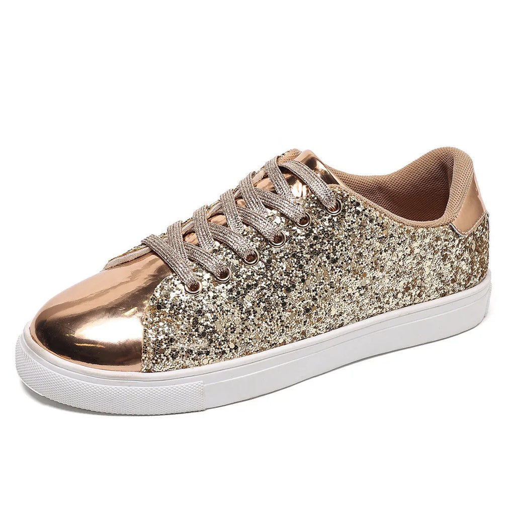 Women's plus size sequined board shoes in black with front lace-up fastening and flat rubber sole.