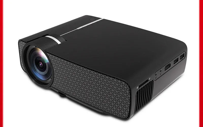 YG400 black HD LED home projector on a table with a large projected movie scene