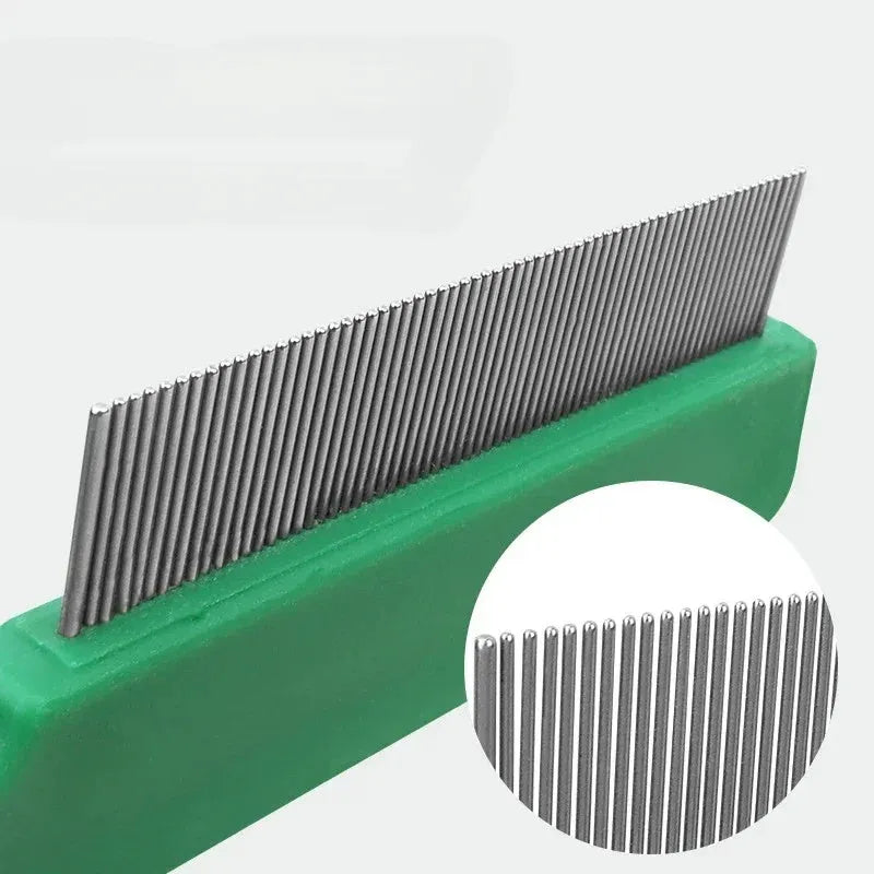 Green pet flea comb with stainless steel pins and plastic handle for dogs and cats