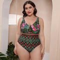 Blue printed one-piece swimsuit with spaghetti straps and a striped vest design for women's swimming.