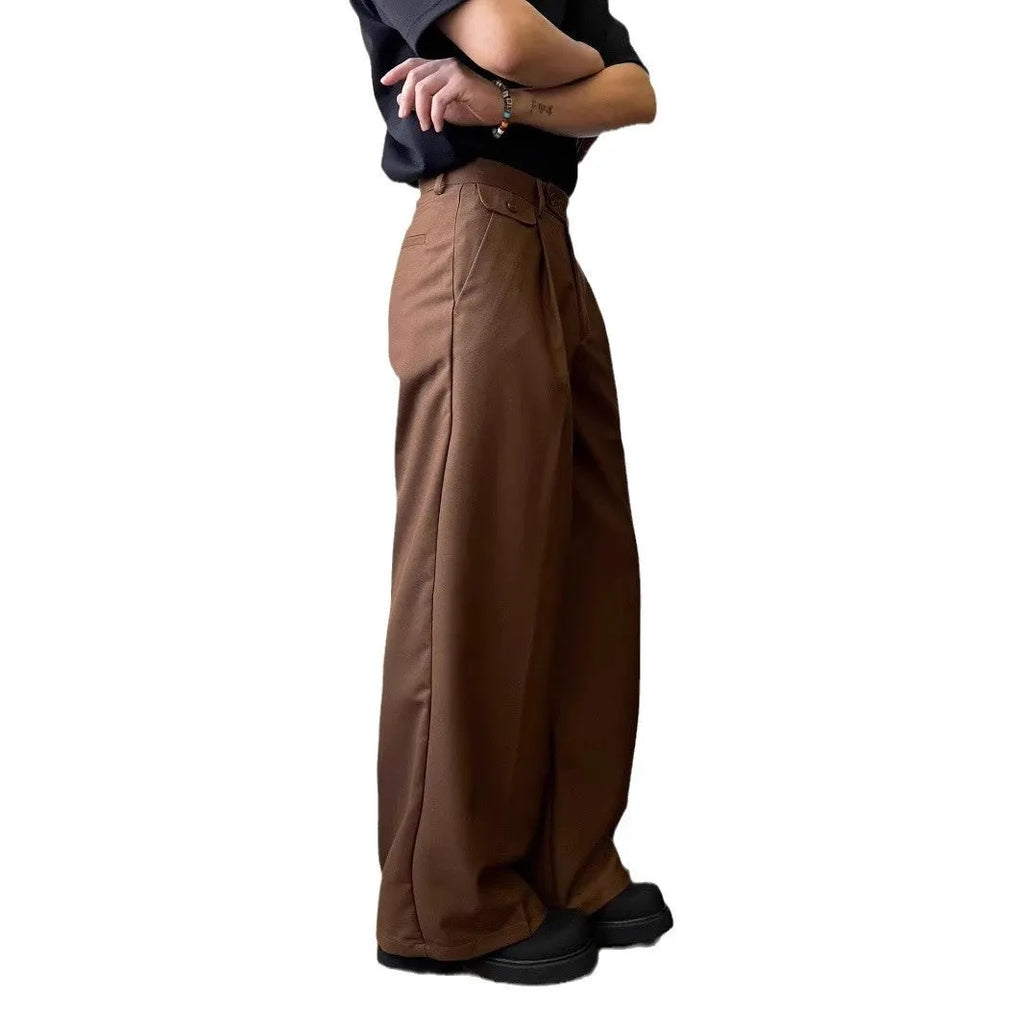 Men's brown straight-leg wide-leg casual trousers showing drape and fit