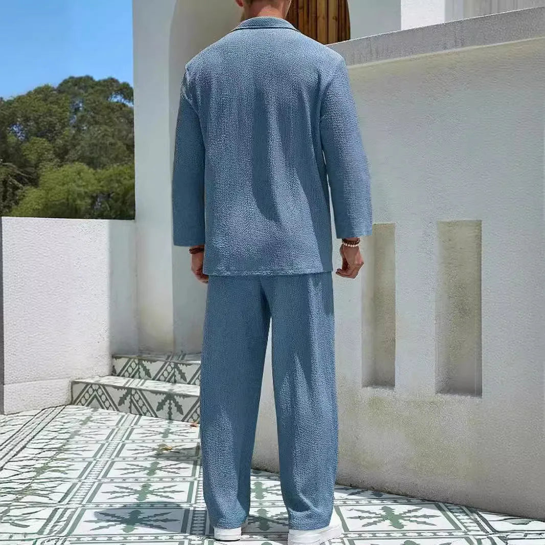 Man wearing a lake blue casual shirt and trouser suit set for commuting.