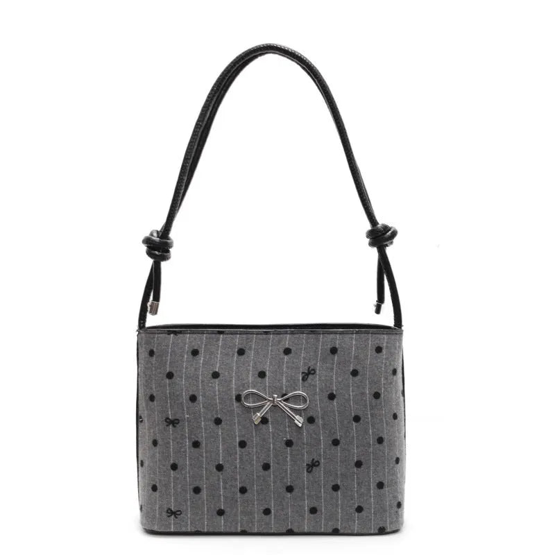 Canvas polka dot crossbody bag in bow design with double shoulder straps, hard medium shape, four colour options
