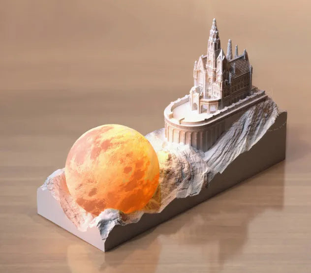 Small mountain-shaped LED night light with touch control, shown as part of a gift box set with essential oil and card for bedroom or desktop decoration.