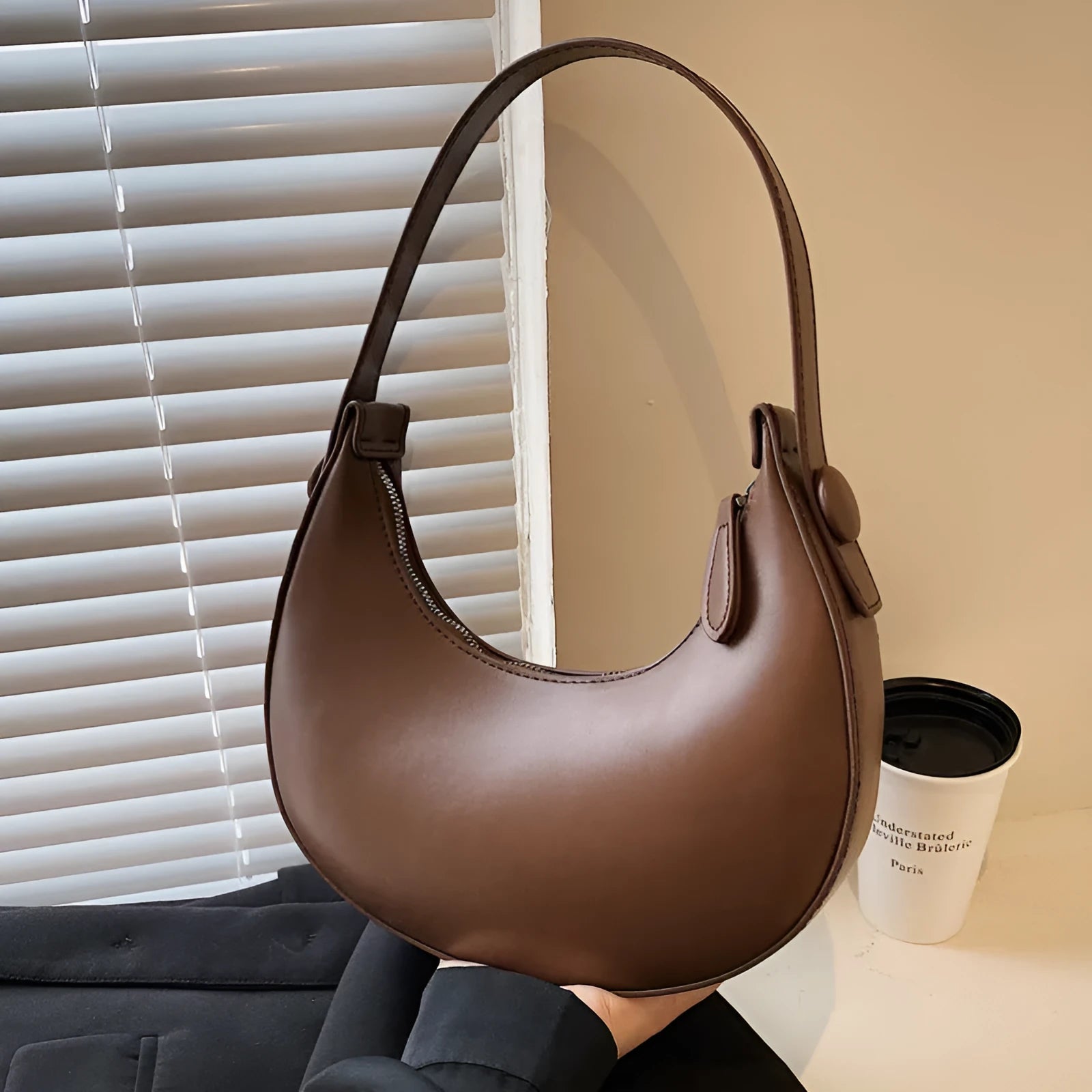 Retro dumpling shape shoulder bag in PU leather showing dimensions 21x20x6cm with zipper change bag interior