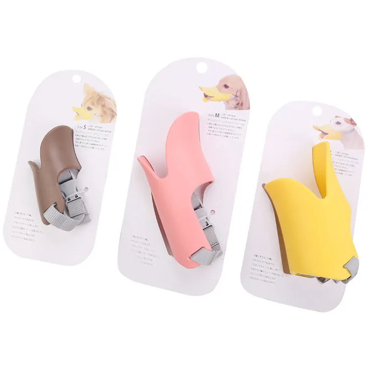 Silicone dog mask duckbilled sleeve anti-bite in bright yellow, pink, and brown sizes S M L