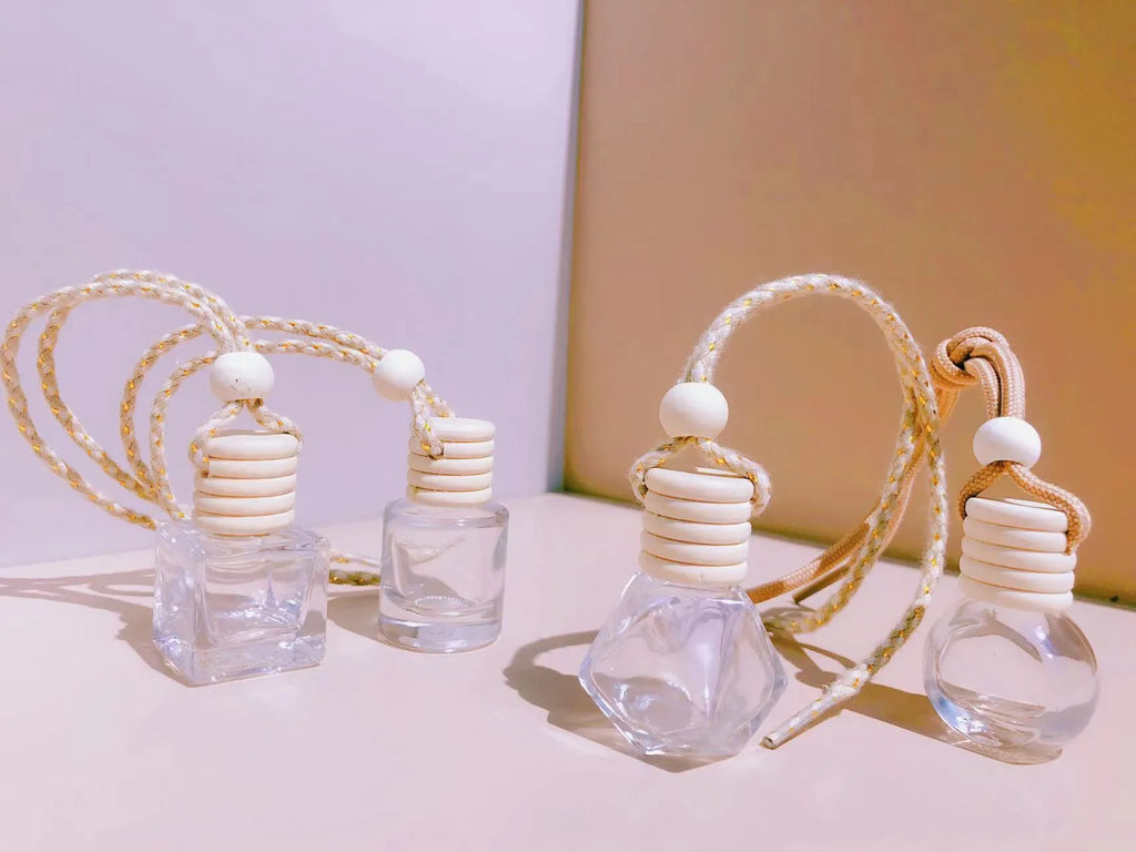 Car perfume pendant in glass with four style options for vehicle air freshening