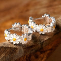 White daisy flower fashion earrings with platinum gem setting on copper construction