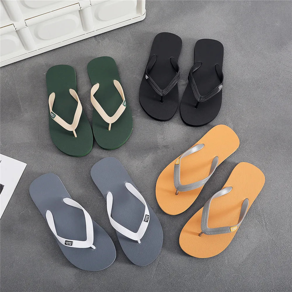 Men's black rubber sole flip-flops with a lightweight EVA upper, shown from the side.
