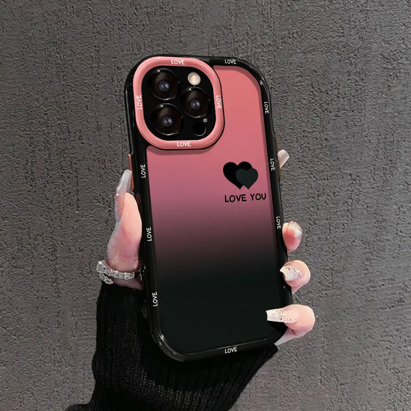 Cream coloured acrylic phone case with black gradient love heart design, showing fine-hole cut-outs for ports.