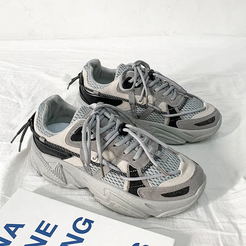 Men's white Korean-style platform dad shoes with lace-up front and breathable mesh lining.