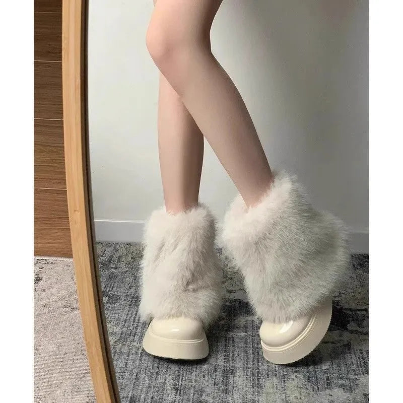 Women's black fleece-lined snow boots with waterproof rubber sole and round toe