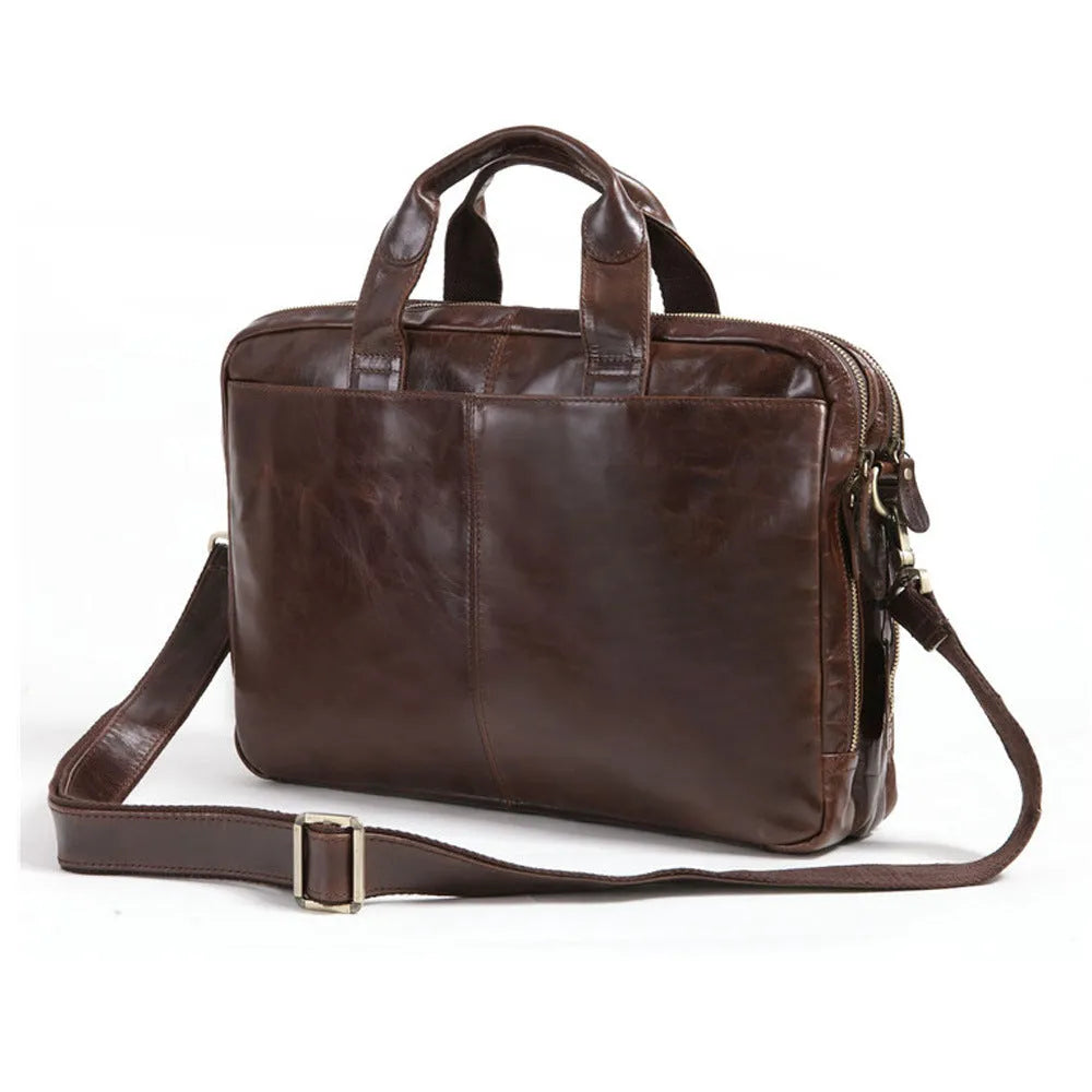 Brown men's first layer cowhide business briefcase 18 inch laptop bag on table