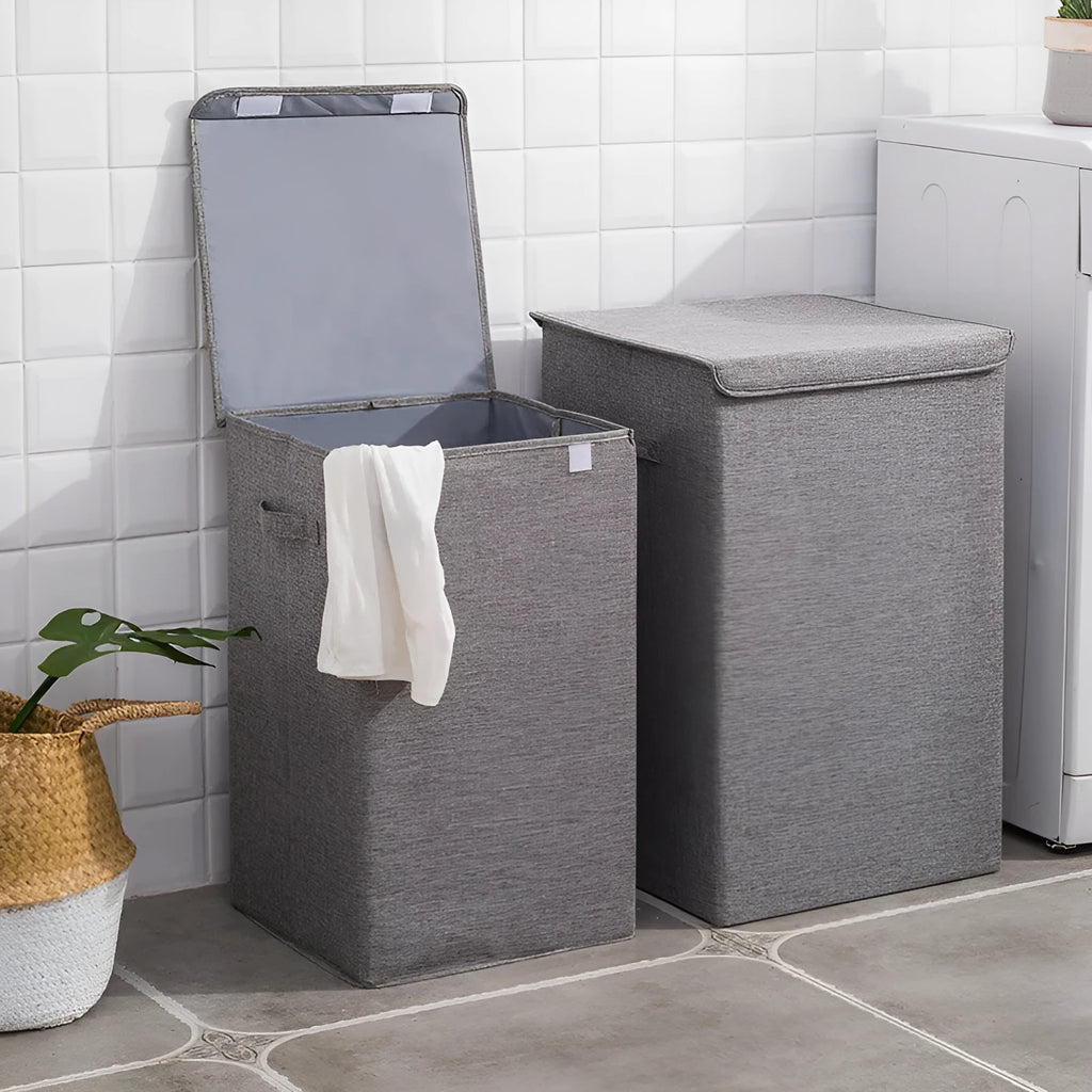 Foldable cotton linen storage basket in grey colour showing three-dimensional shape.