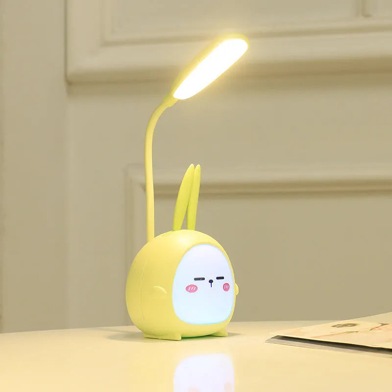 Cartoon deer USB charging folding LED reading lamp with plastic shade on desk