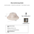 Beige wine bottle-shaped camping lantern with USB-C charging port and LED lights
