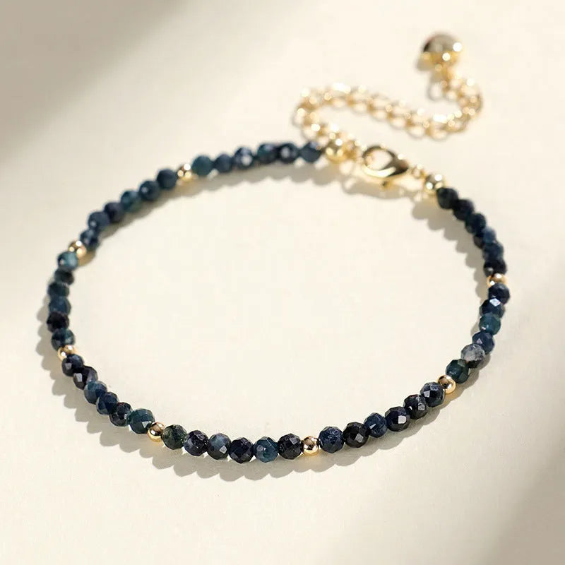 Blue tourmaline beaded bracelet with 3mm gemstone beads and spacer detailing