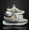 Men's white low-top lace-up sneaker with woven mesh upper and flat rubber sole