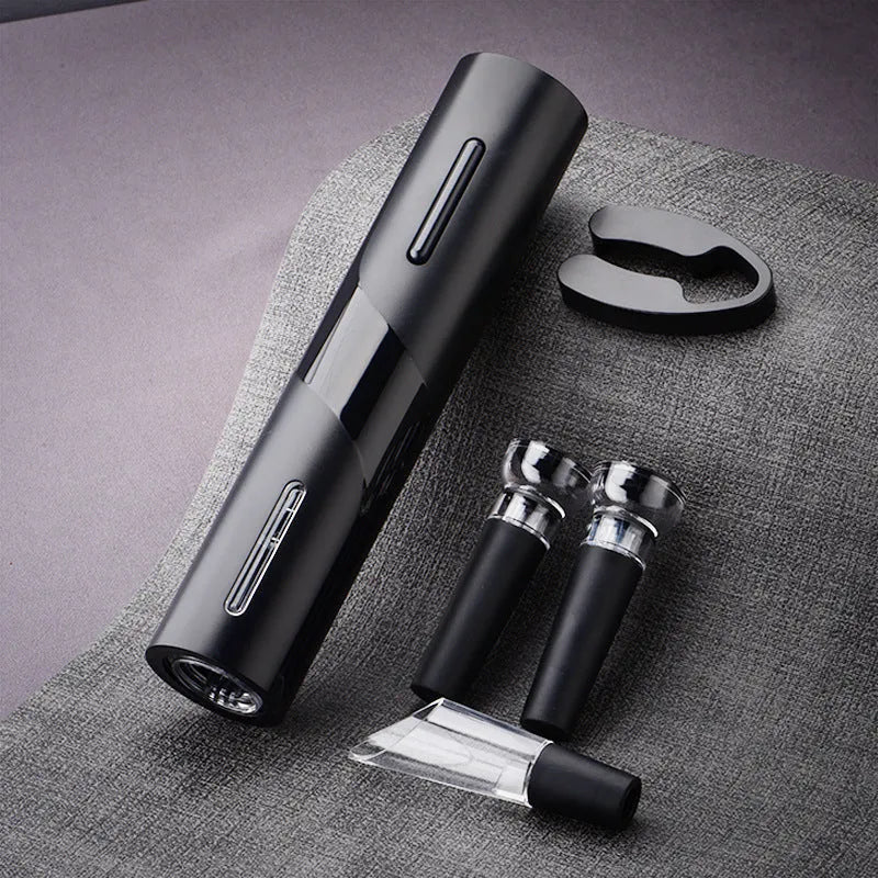 New Base five-in-one electric bottle opener set with black ABS decanter, vacuum stopper, foil knife, and storage base