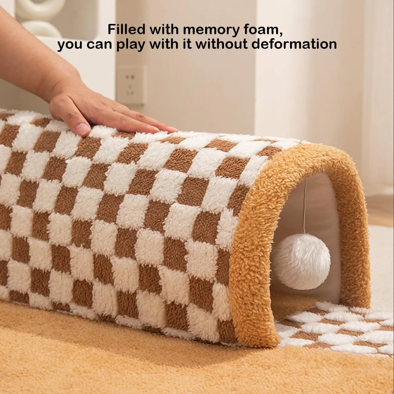 Coffee coloured plush dog and cat bed with integrated tunnel, shown in a fan-shaped plaid design