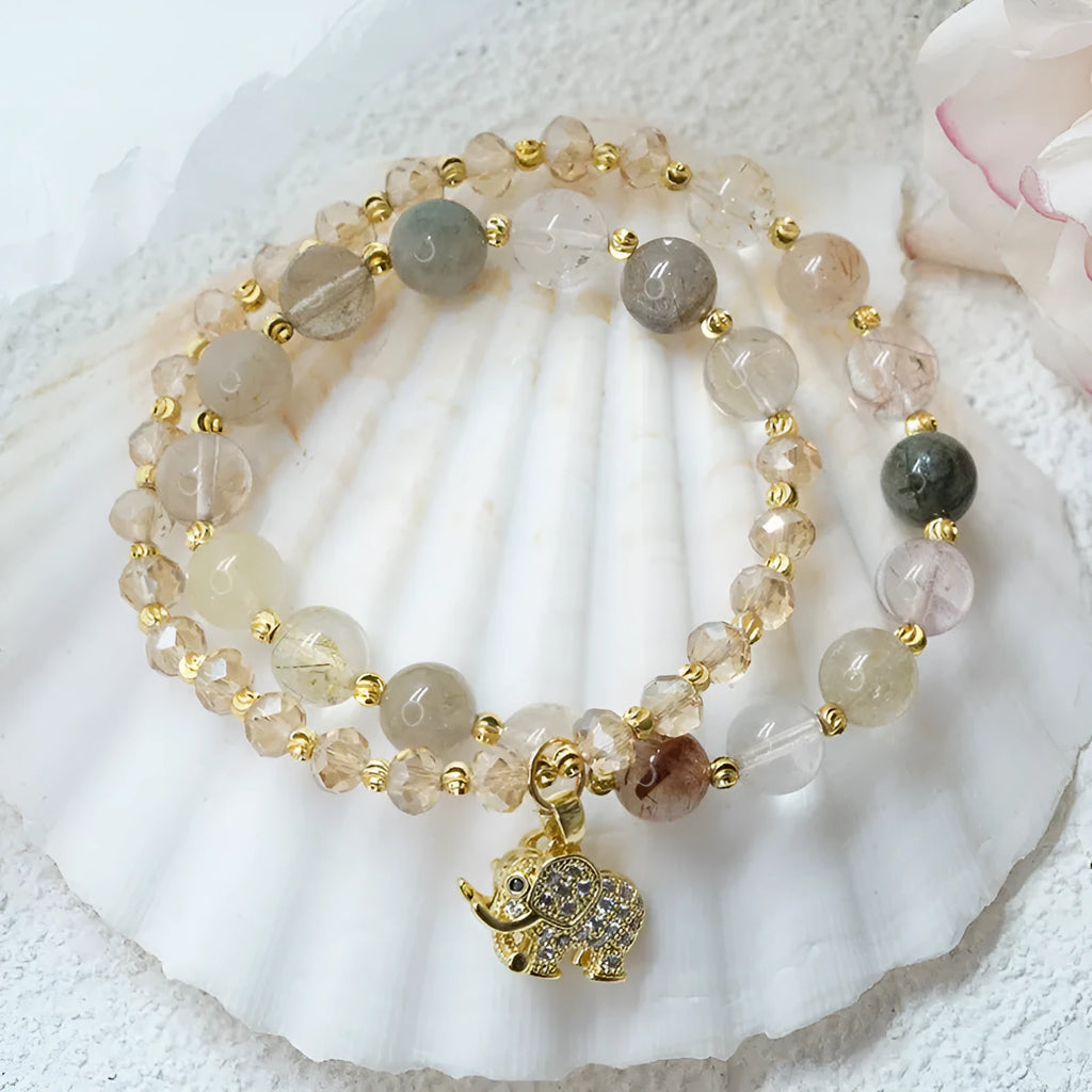 Retro style women's bracelet made with colour hair crystal and a strawberry quartz gemstone.