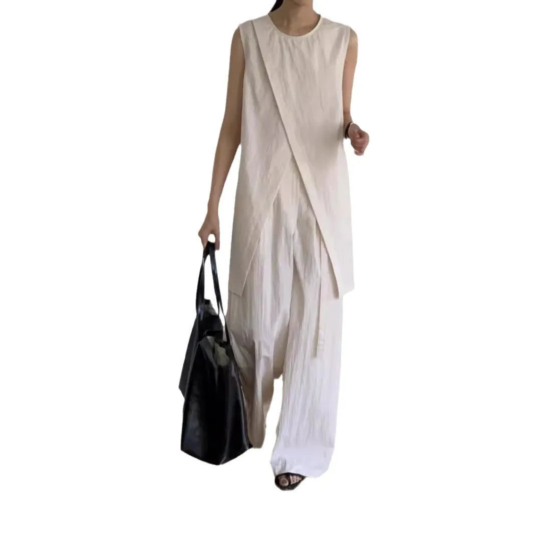 Split sleeveless lace-up top and high waist wide leg pants two-piece set in light apricot or black, average size
