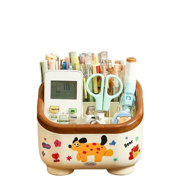 Cartoon-style plastic desktop organiser with various red and brown storage boxes and a pen holder.