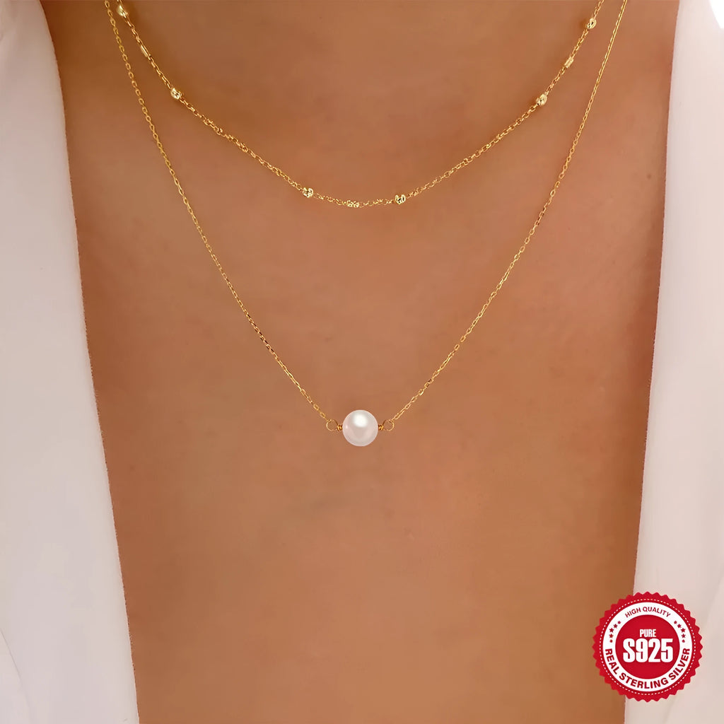S925 sterling silver necklace with double layer design and twin pearls in gold or white gold colour