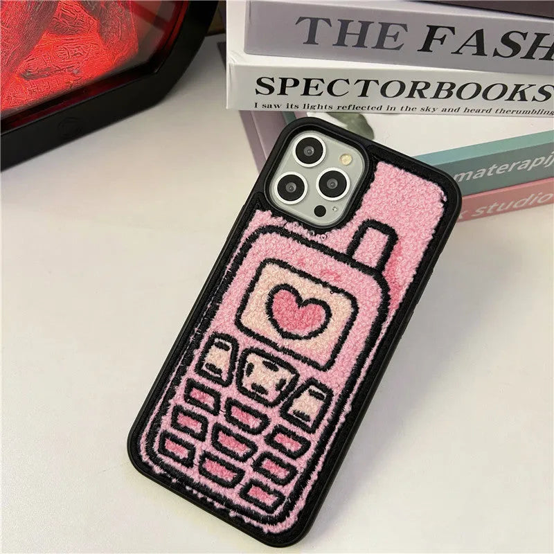 Pink TPU iPhone case with embroidered towel fabric design on back cover