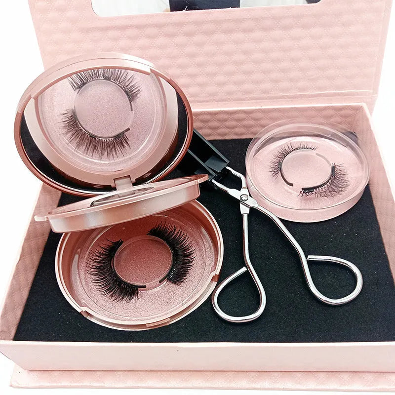 Three pairs of black quantum magnetic false eyelashes with ice silk hand-leg hair and a quantum eyelash curler.