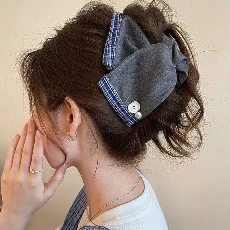 Women's triangle hair grip with denim fabric bow decoration on plastic hairpin