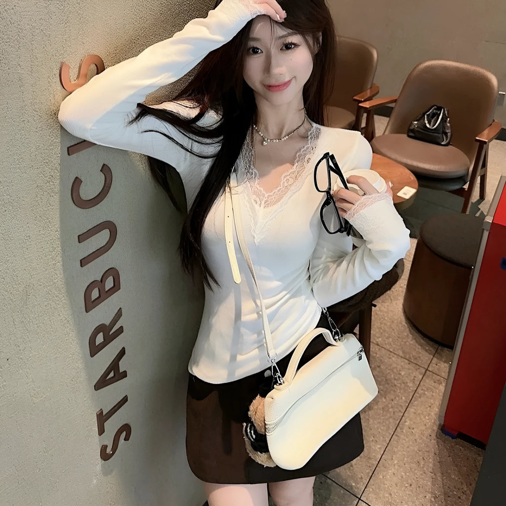 White V-neck long sleeve top with lace stitching and brushed finish, slim fit, sizes S-XL.