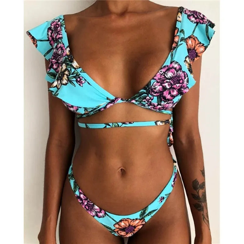 Yellow floral print split bikini swimsuit on a mannequin, showing front and back views.