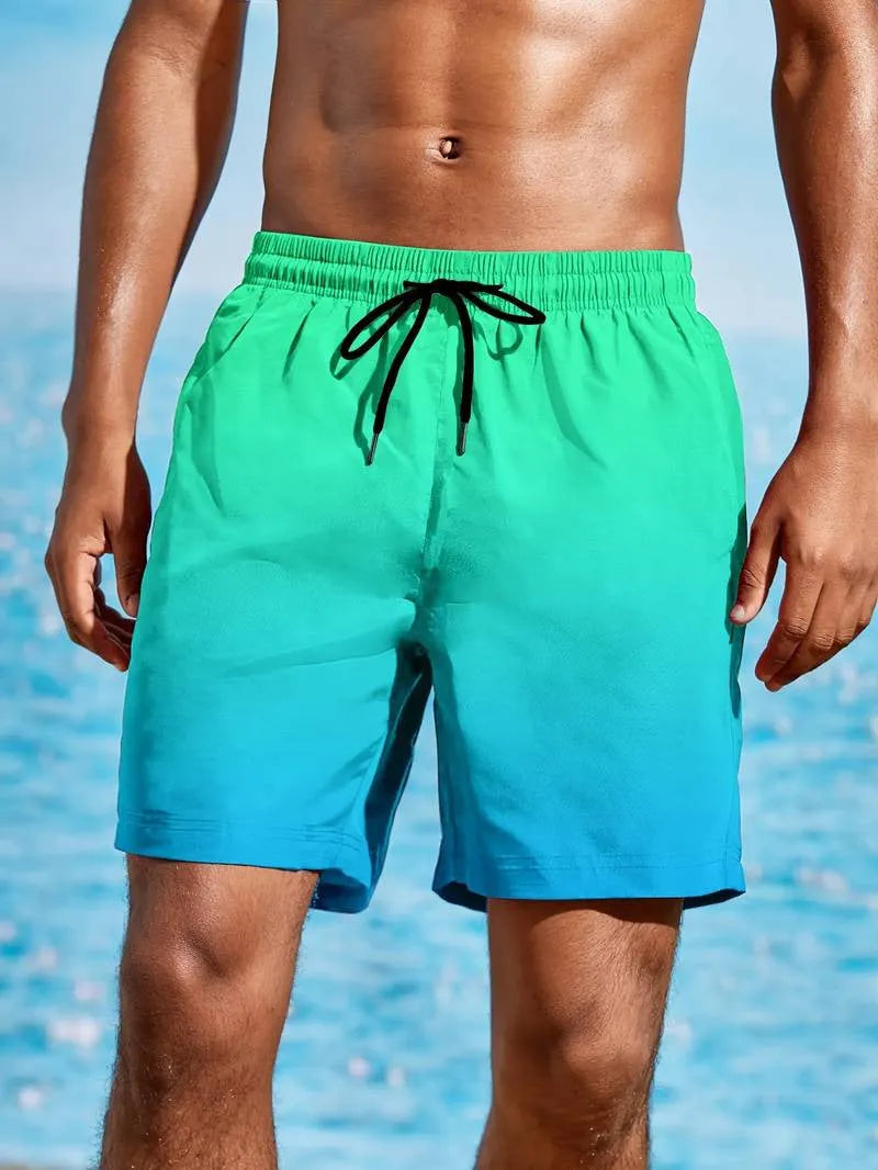 Men's grey gradient colour 3D digitally printed sports shorts made from stretch mesh fabric.